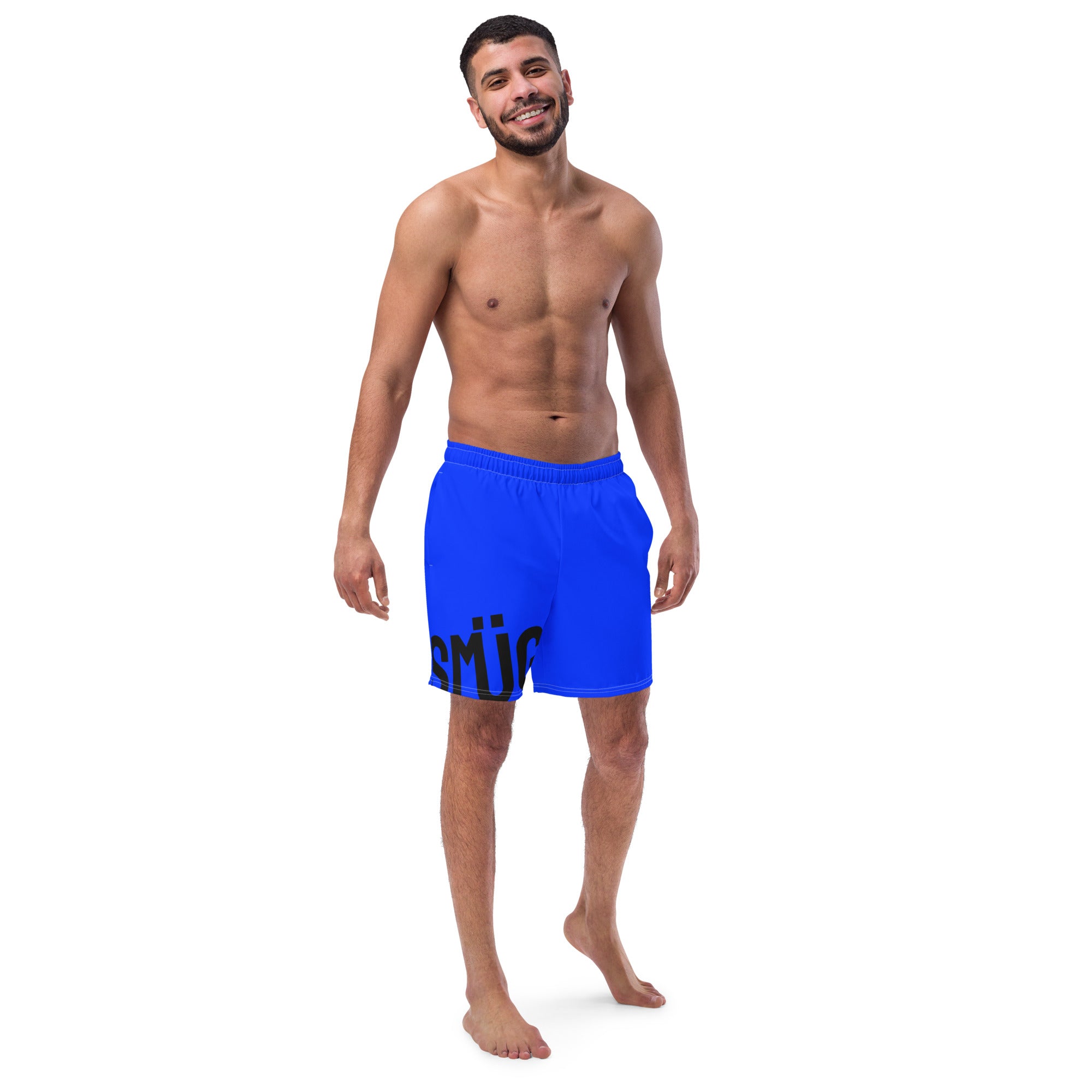 Man wearing blue swim shorts with a brand logo on a white background