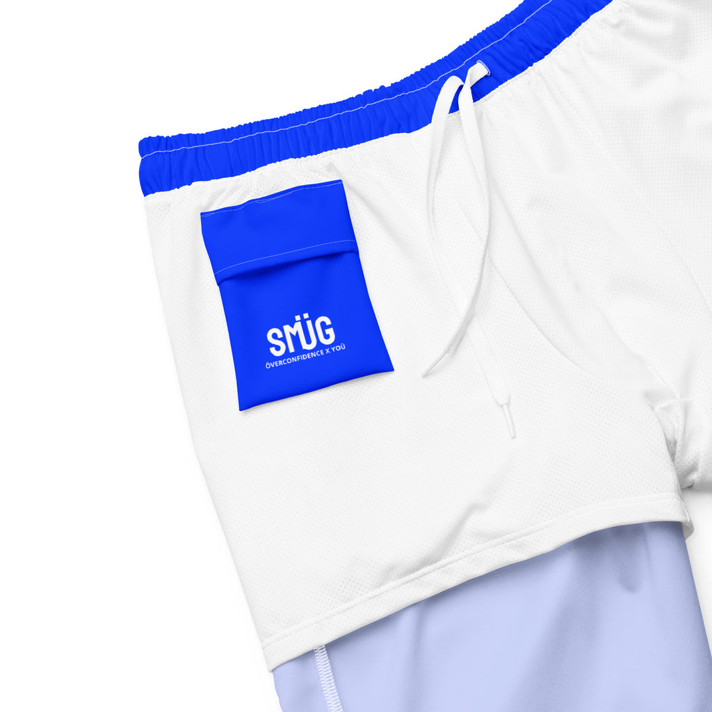 White shorts with blue waistband and SMÜG logo on a white background